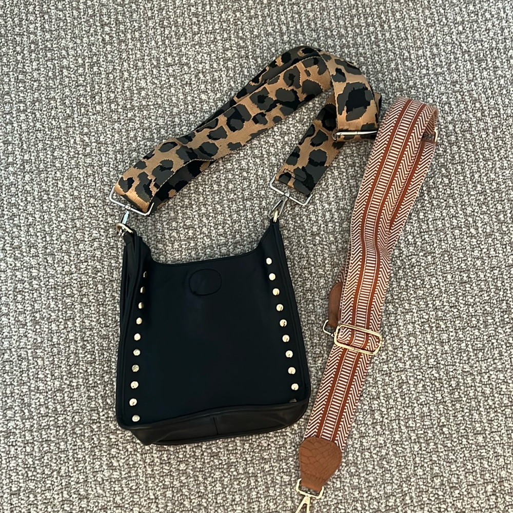 Ah-dorned bag.  Can be worn as crossbody and extra strap included. Like new